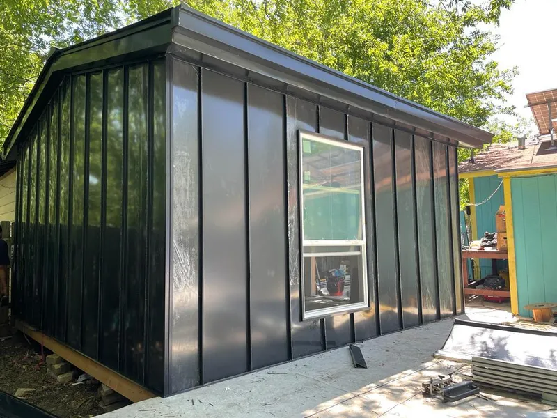 Black standing seam metal wall panels for Metal Roof Installation in Pavilion