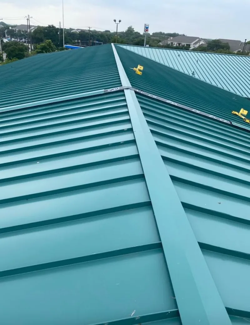 Green commercial metal roof ridge and valley for Metal Roof Repair in Pavilion